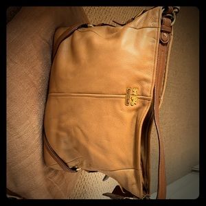 A very practical Genuine Coach bag pebble leather.